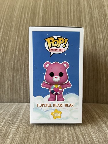 Funko Pop! Care Bears 40th Hopeful Heart Bear #1204 Brilla en la oscuridad rosa PERSECUCIÓN - Imagen 4 de 6