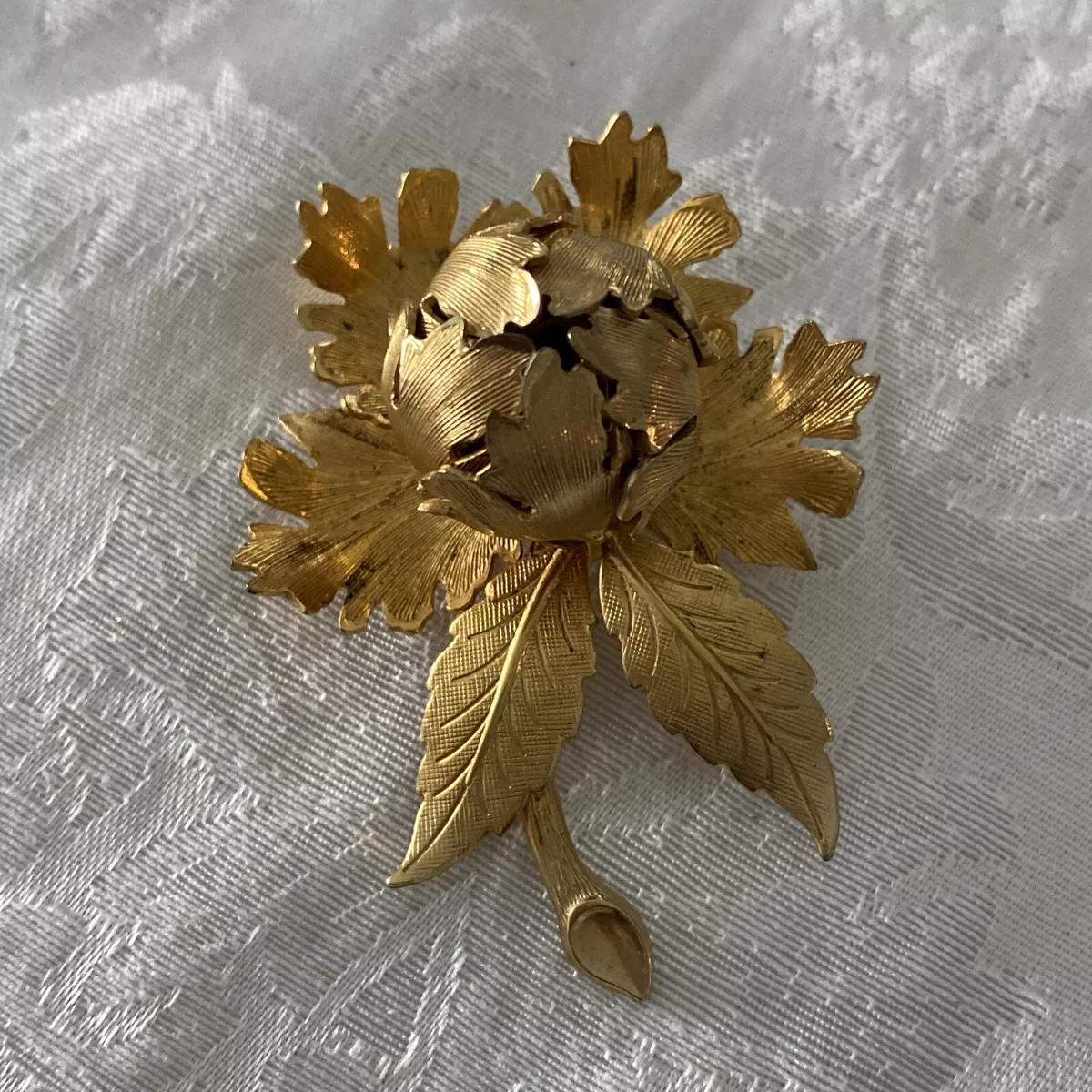 Warner brooch deals