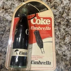 Vintage 1985 Coca Cola Bottle Shaped Umbrella. New in Packaging.
