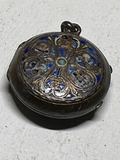 1861 Russian silver & enamel pendant, a locket, snuff box,smelling salt bottle.
