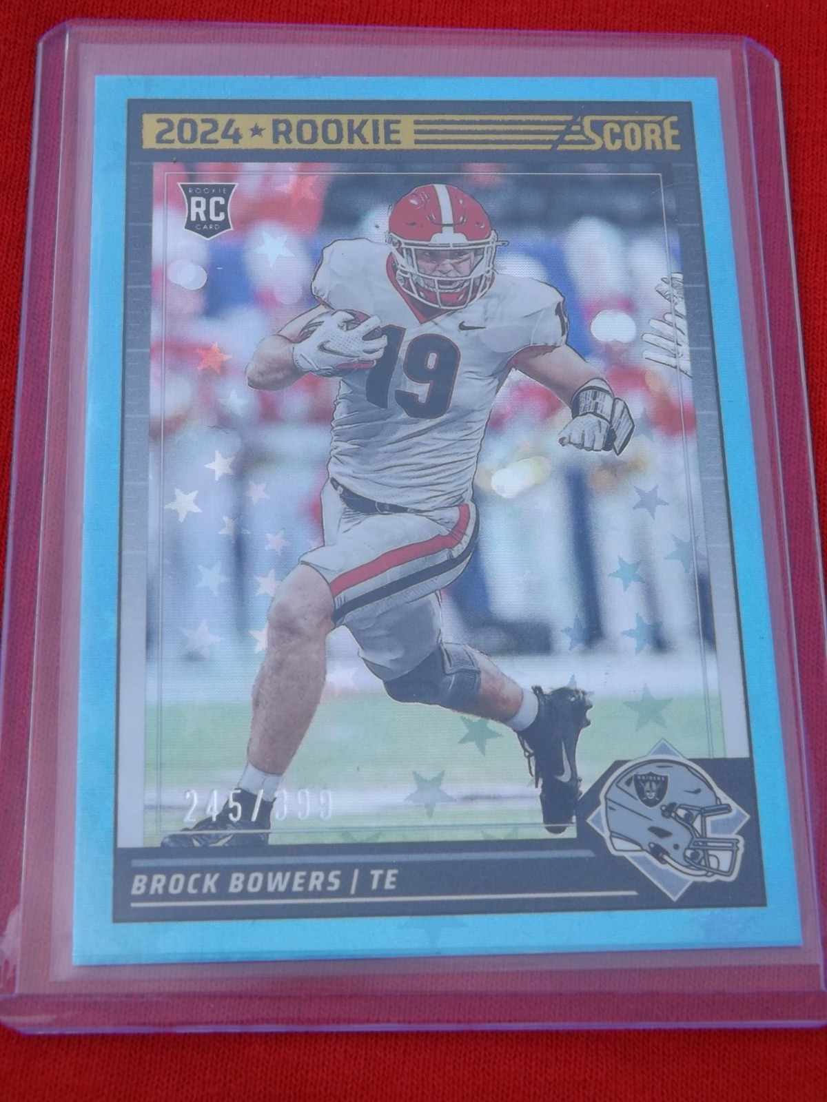 2024 Score Brock Bowers #310 NUMBERED 245/399 STARS BLUE REFRACTOR ROOKIE
