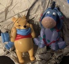 2 Disney Ornaments Pooh With Scarf  Eeyore Tangled In Lights