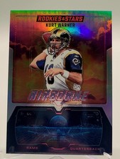2025 ROOKIES & STARS KURT WARNER AIRBORNE SILVER FOOTBALL CARD RAMS NFL 15