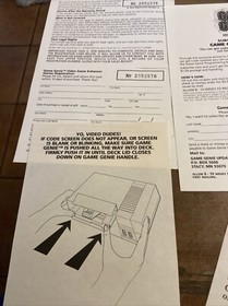 Lot of 4 Game Genie NES Nintendo system Inserts Registration Card