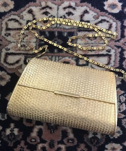 gold woven clutch bag