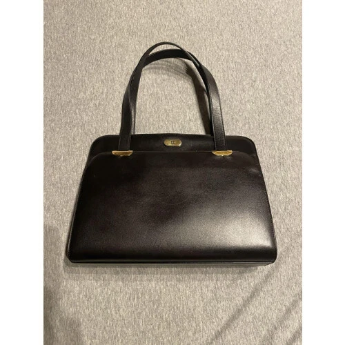 Sac à main Dior cuir noir or quincaillerie CDlogo compact taille France mode