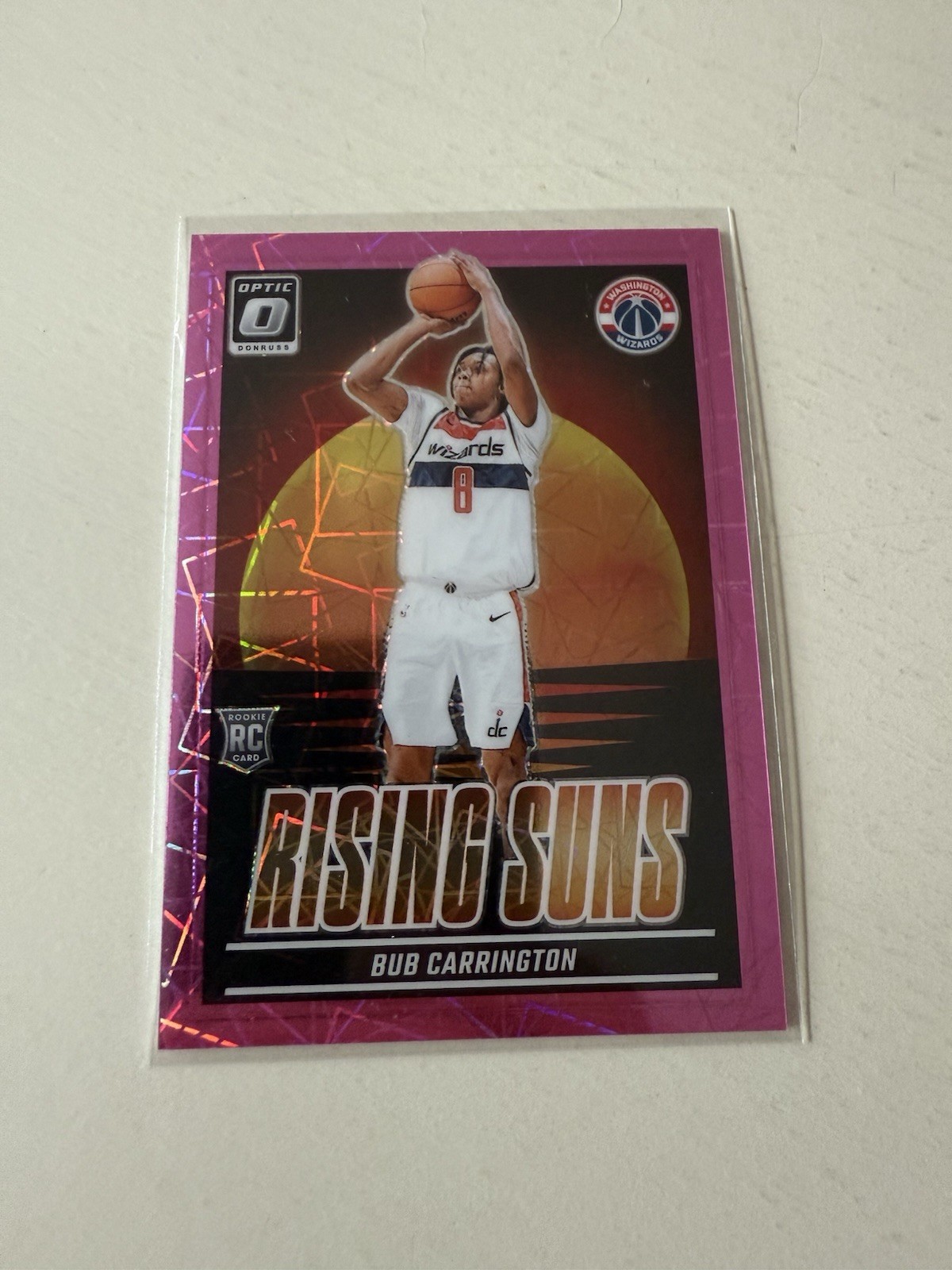 Bub Carrington 2024-25 Panini Donruss Optic /79 Pink Velocity Rising Suns RC #3