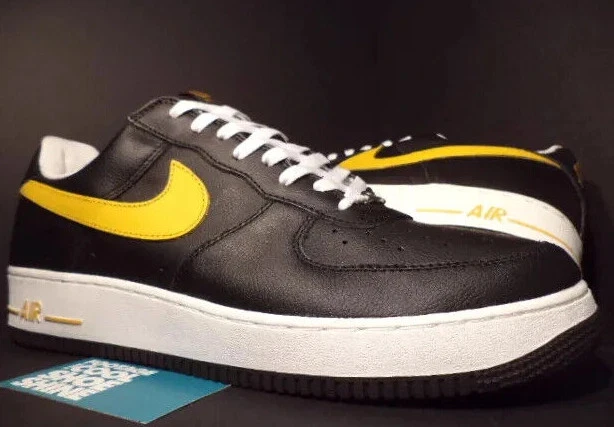 Nike air force 1 top black with yellow swoosh