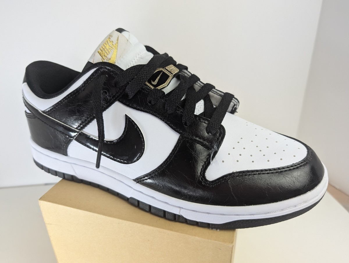 goat nike dunk low black and white