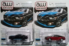 Auto World 2015 Ford Mustang GT Petty Garage Ultra Red Chase + Basic