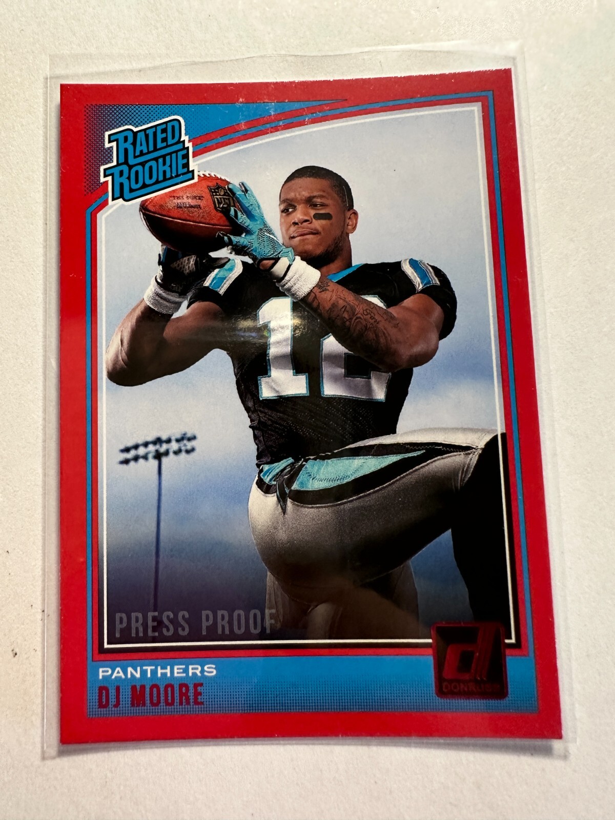 K21,093 - 2018 Donruss Press Proof Red #316 D.J. Moore RR