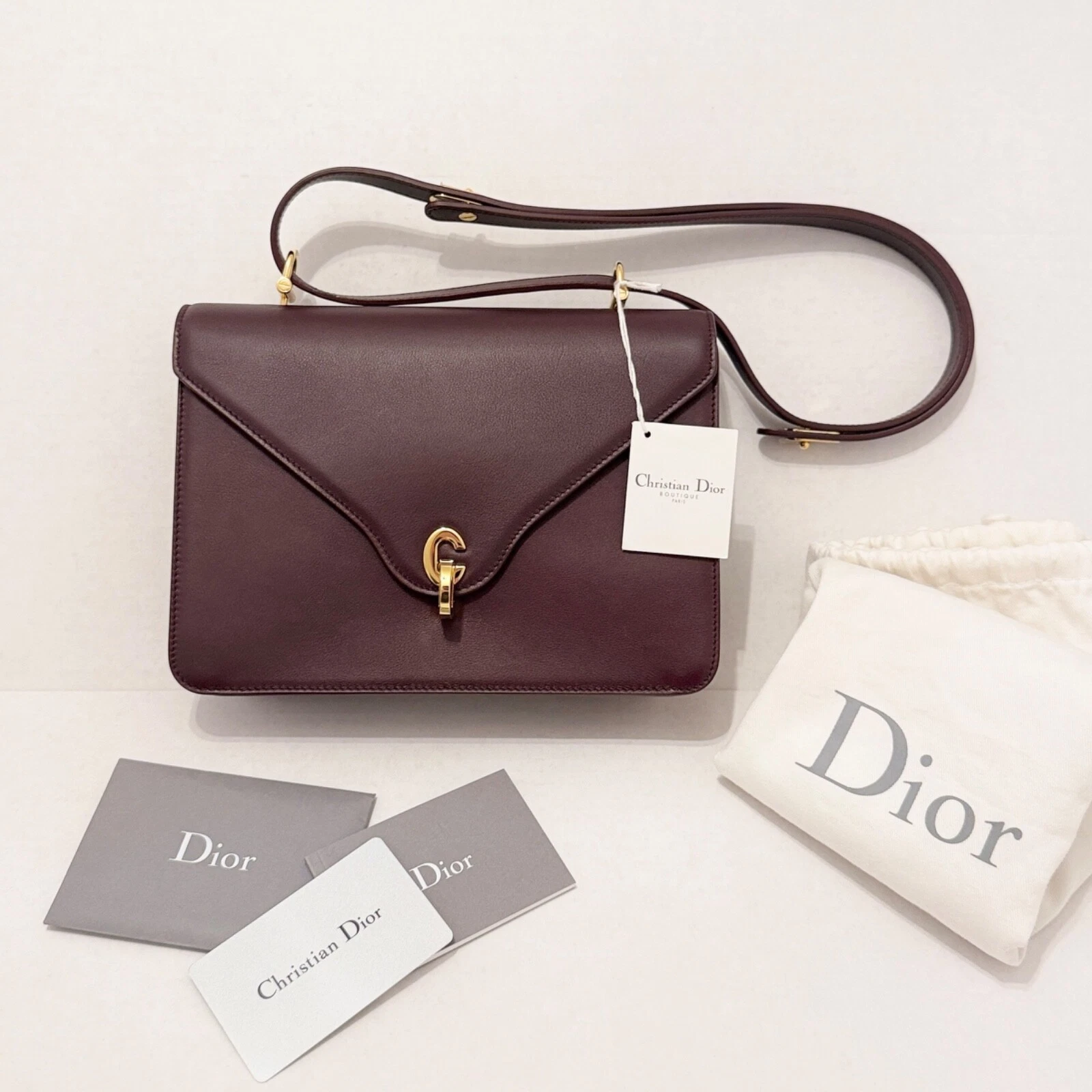 Sac à rabat Christian Dior C'est Dior en cuir bordeaux amarante profonde
