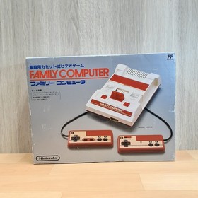 Japanese original Famicom in box with 8 games Family Computer HVC-001 1983 CIB