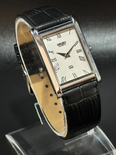 Vintage Seiko Slim Quartz Men's Wrist Watch /Silver Case/ Black Leather strap