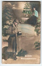 Christmas Postcard German Military Man In Helmet Rifle Decorated Tree Women WW1