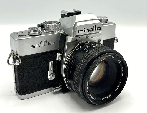 Minolta SRT 102 35mm SLR Camera with MC 50mm f/1.7 Lens UNTESTED