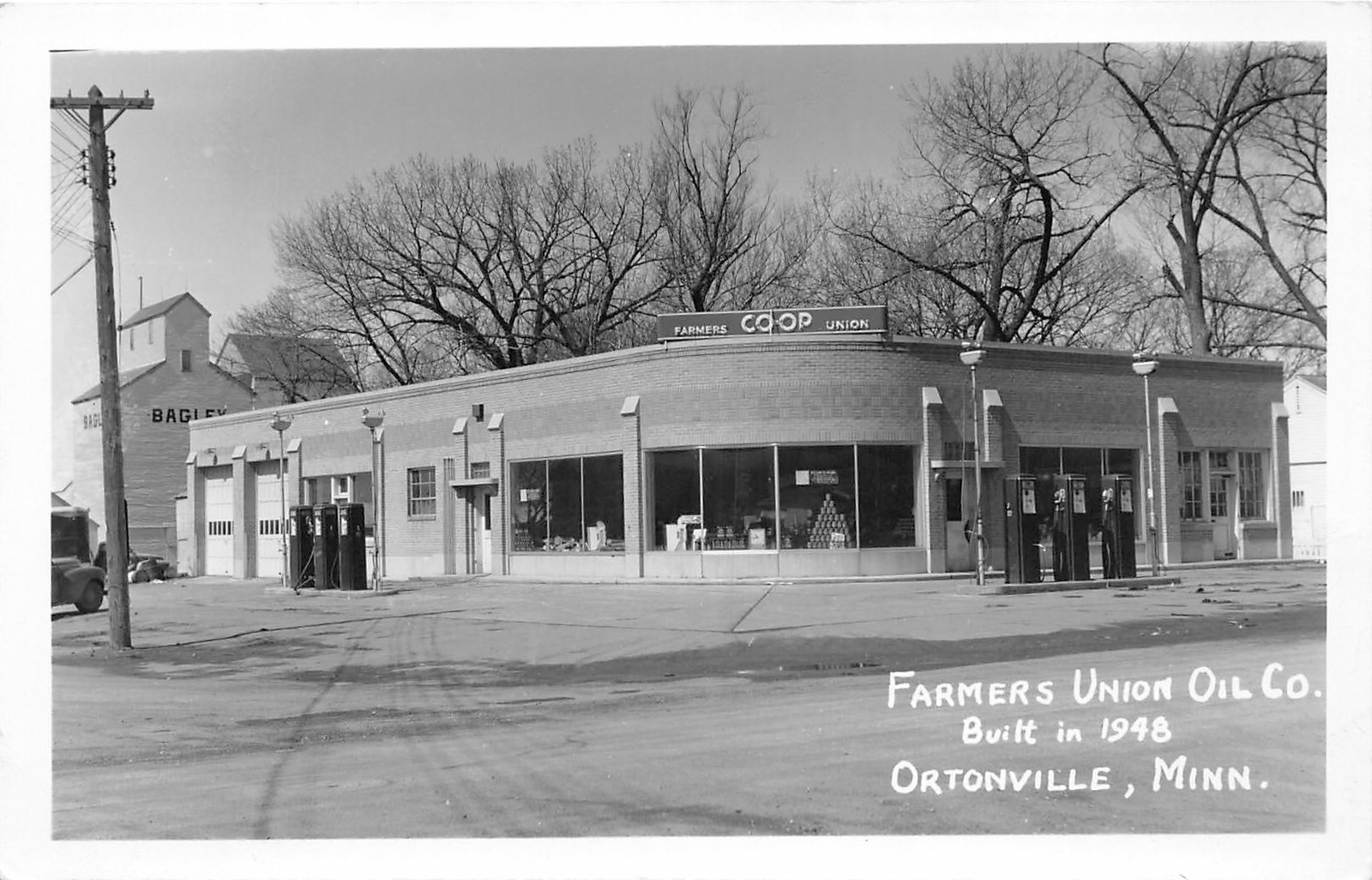 F40/ Ortonville Minnesota RPPC Postcard c1950s Farmers Oil Company Gas