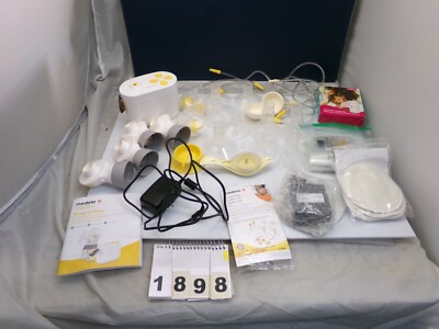 MEDELA PUMP IN STYLE BREAST PUMP W/ ACCESSORIES & CARRY CASE