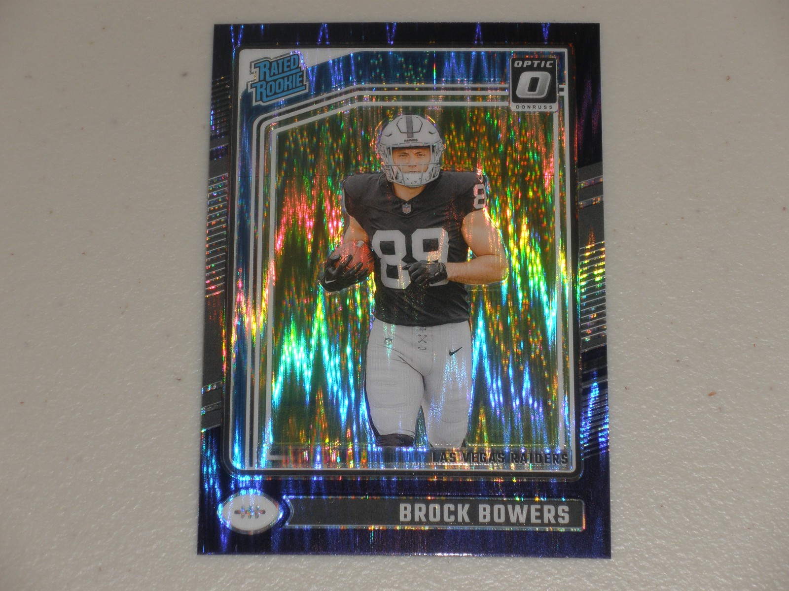 2024 Donruss Optic Rated Rookie Purple Shock Prizm #215 Brock Bowers RC