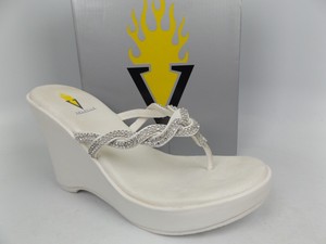white volatile sandals