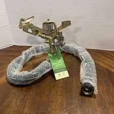 1 Pasture Master 3/4” adjustable Brass Impact Sprinkler & Commercial steel Bases