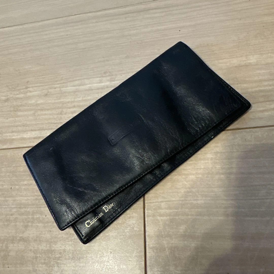 Portefeuille Christian Dior double pli cuir noir luxe fabriqué en Espagne