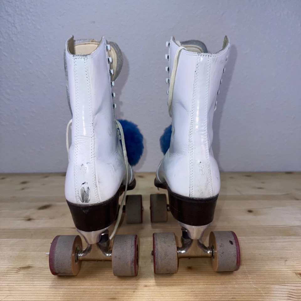 Patines sobre ruedas vintage medalla de bronce 324 placas Chicago Fo-Mac ruedas pompones Foto 4 de 4