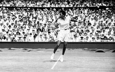 Althea Gibson of USA makes a return to Darlene Hard during their t- Old Photo