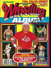 EB3003 Superstar Billy Graham  Mil Mascaras  signed Wrestling Magazine  w/COA 