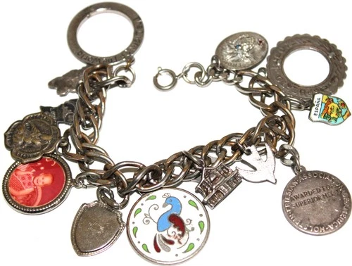 Beautiful vintage mixed charms bracelet few are sterling silver Lot#122