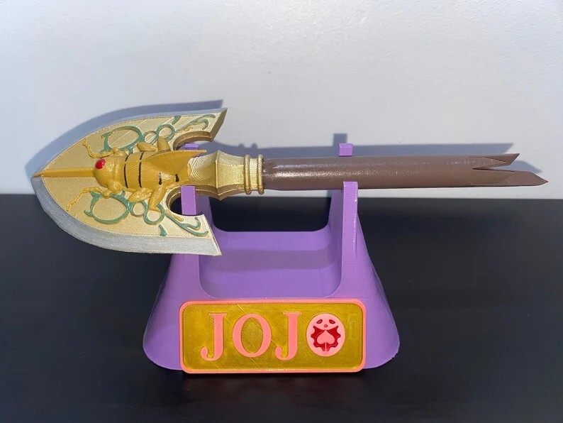 Flèche de JoJo en alliage de zinc haut de gamme avec finitions gravées or antique