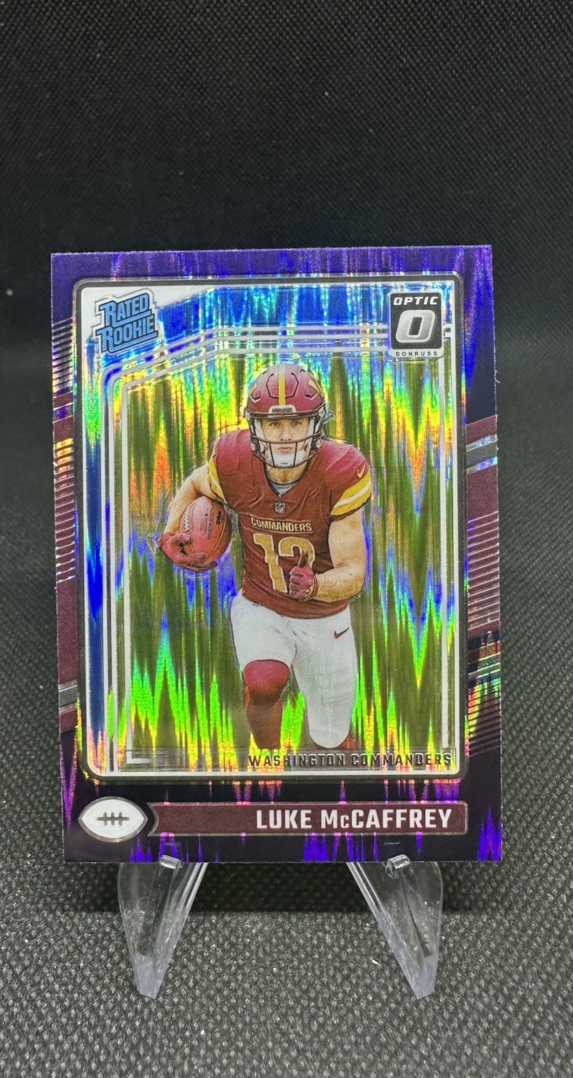 2024 Donruss Optic Luke McCaffrey Purple Shock Rated Rookie #268 RC Commanders