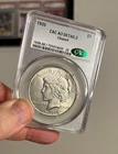 1935 Peace Silver Dollar, CACG AU, Details cleaned