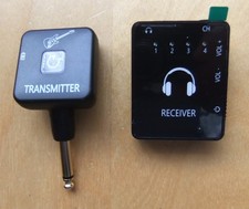 Wireless in ear monitoring system with transmitter and receiver