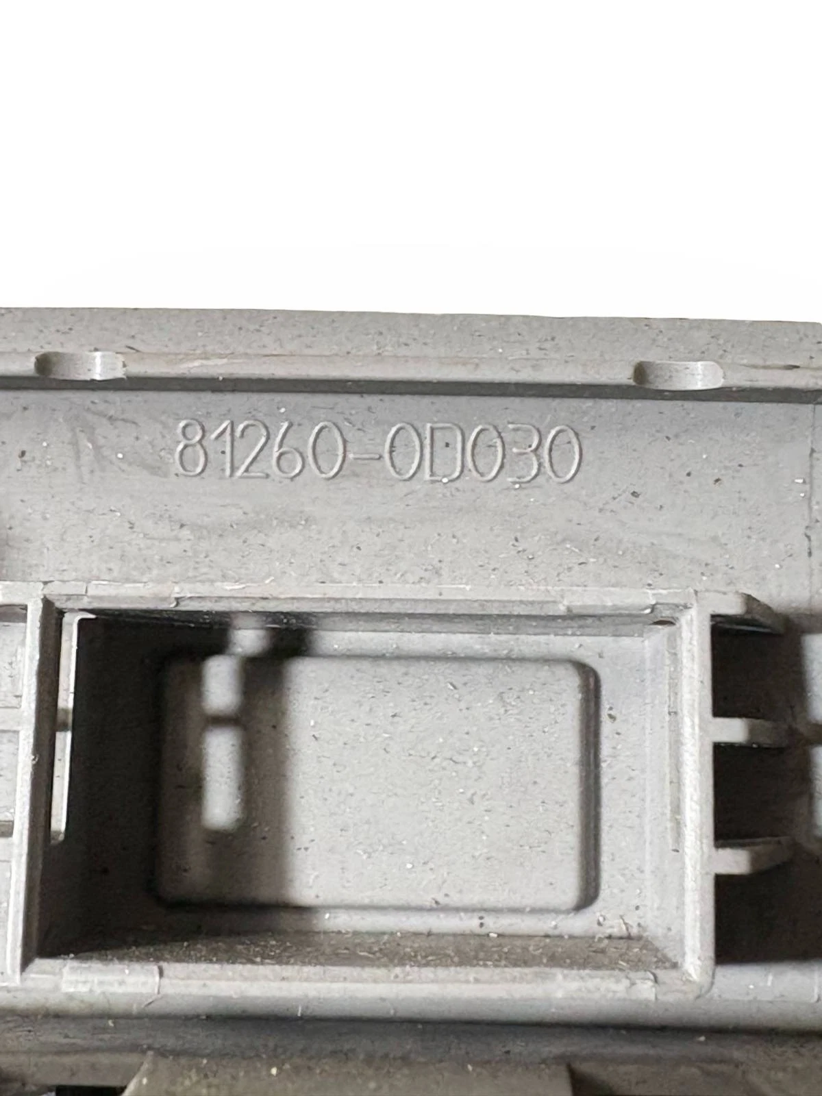 Stamped Toyota Yaris part number 81260-0D030