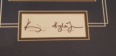 KENDALL & KYLIE JENNER AUTOGRAPH CUT WITH COLOR PHOTO 12X16 MATTED