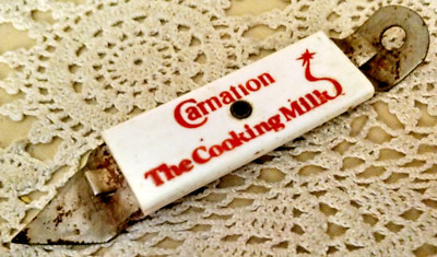 CARNATION MILK BOTTLE OPENER VINTAGE COOKING MILK RED WHITE PLASTIC MAGNET METAL