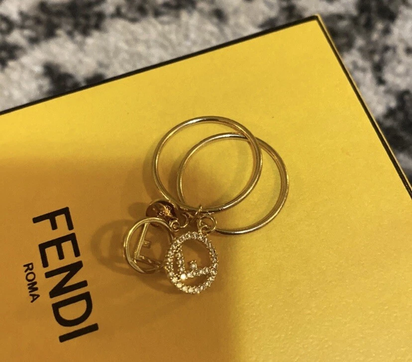Fendi F is Fendi Double Charm ring Metal and Crystal Oro Size L