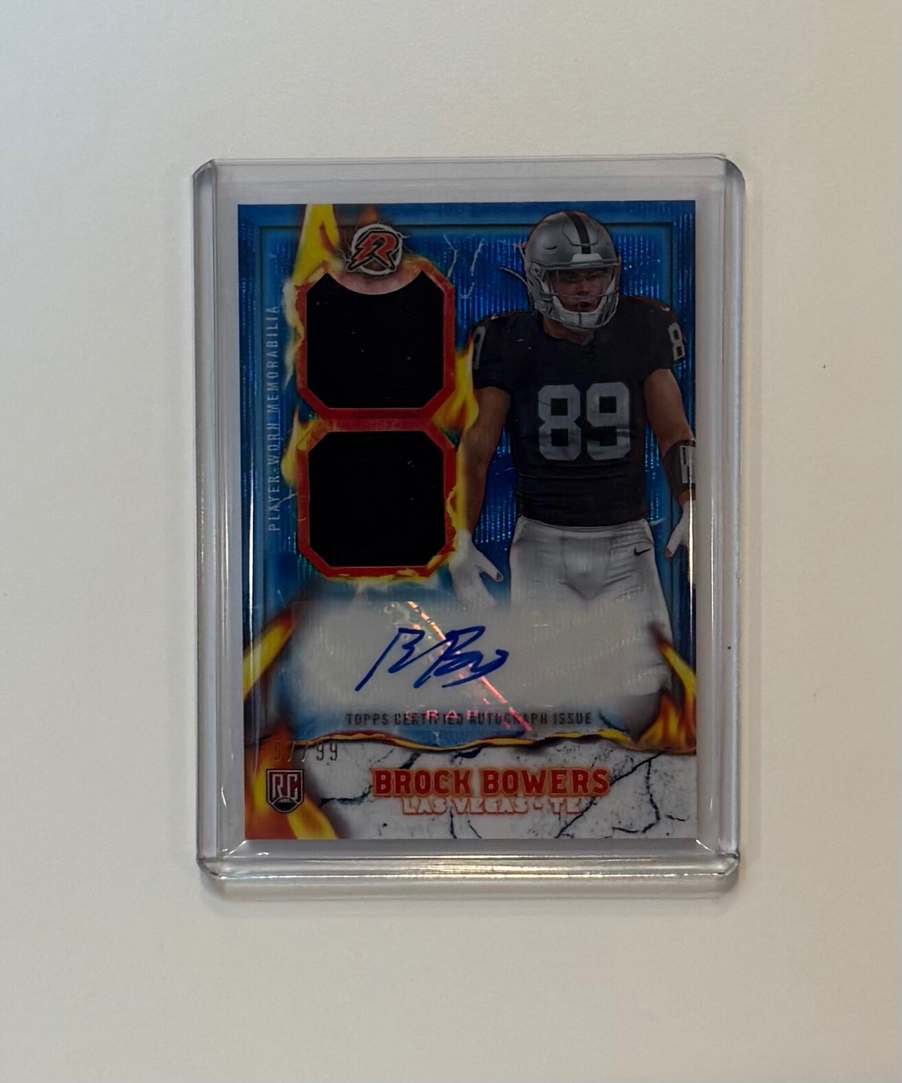 2024 Topps Resurgence Brock Bowers Blue Surge Ignite Dual Patch Auto RC 97/99