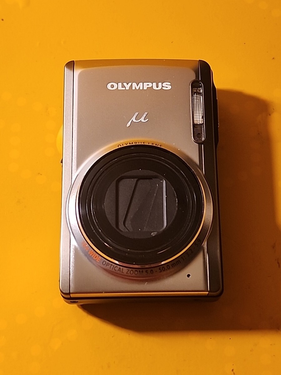Olympus μ[mju:] 9010 Champagne Gold 14.0 MP Digital Camera READ