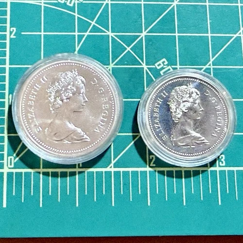 1974 & 1975 Canada Silver Dollar Coins 50% Calgary Winnipeg ASW ~0.75 oz