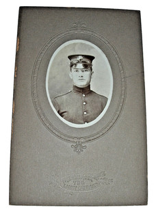 WW I era U.S. MARINE DISPLAYING the GLOBE and ANCHOR INSIGNIA ON HIS CAP