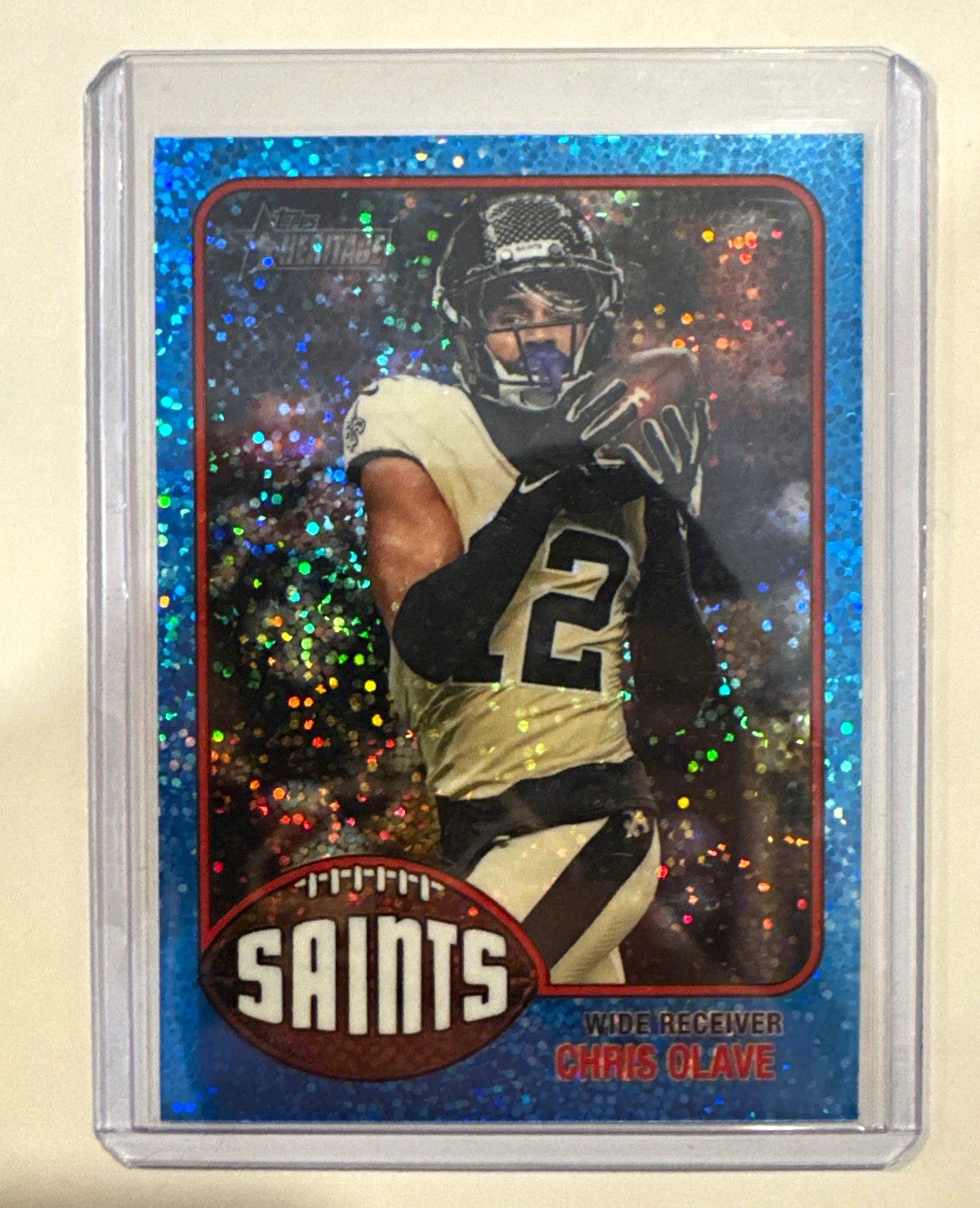 Topps 2026 Heritage Chris Olave BLUE Sparkle Parallel #49 New Orleans Saints