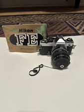 Nikon F3 35mm film camera with prime Nikkor lenses 28-200mm