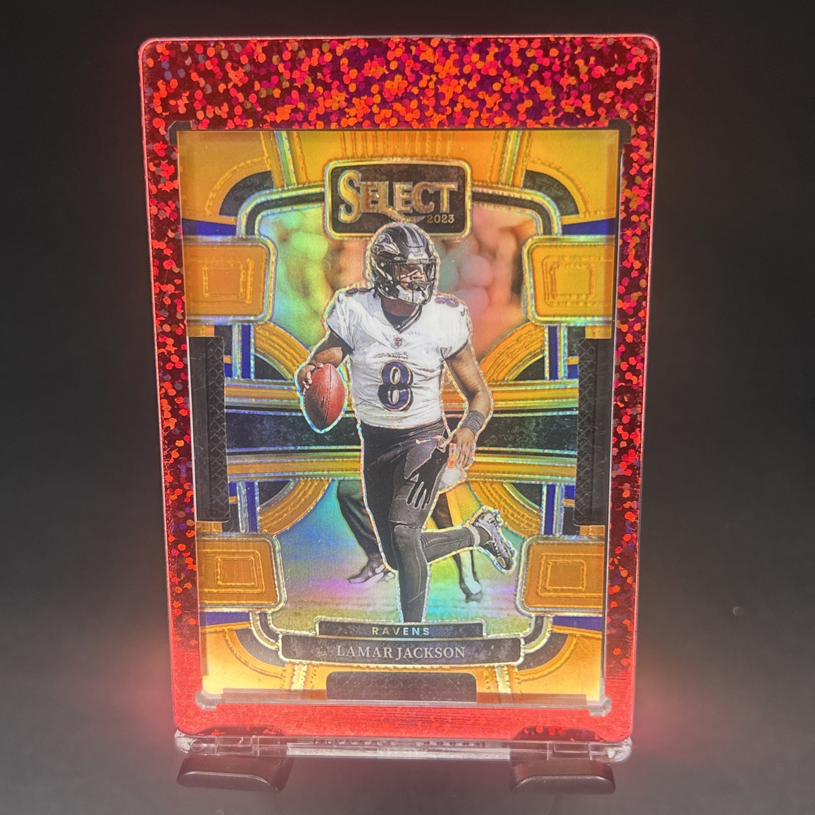 2023 Panini Select - Concourse Lamar Jackson #7 Orange Prizm Die-Cut /499