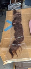 New in sealed package Ponytail Extension 24” Brown with tints FLUFY MOOZ
