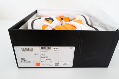 Chanel Women Interlocking CC Orange White High Top Sneakers Chanel Women Interlocking CC Orange White High Top Sneakers
