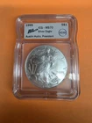1999 AMERICAN SILVER EAGLE ICG MS70 -Singed by Austin Hutto