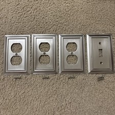 3 Brushed Nickel Outlet Covers  1 Brushed Nickel SwitchPlate w/ Matching Screws