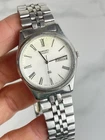 Seiko Men's Vintage Quartz 7123-8260 Day Date Roman Silver Tone Bracelet T862